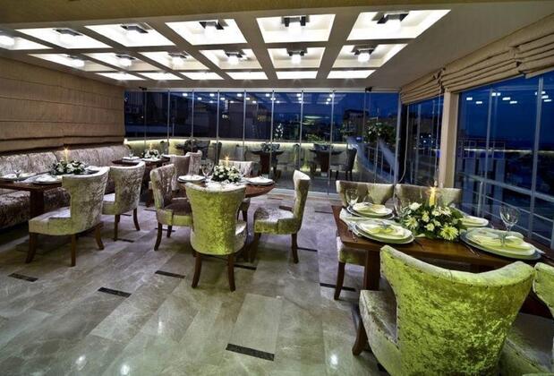 Q Inn Hotel - Görsel 8