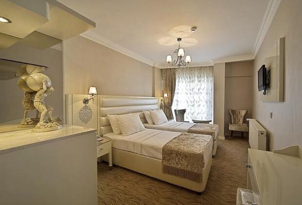 Q Inn Hotel - Görsel 16