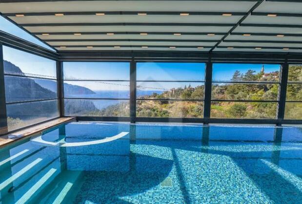 Faralya'da Manzaralı Taş Villa - Görsel 12