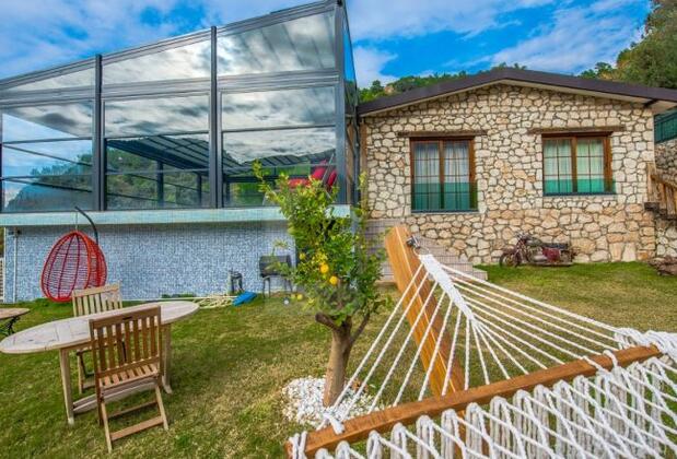 Faralya'da Manzaralı Taş Villa - Görsel 14