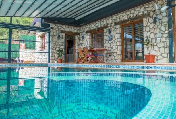 Faralya'da Manzaralı Taş Villa - Görsel 19